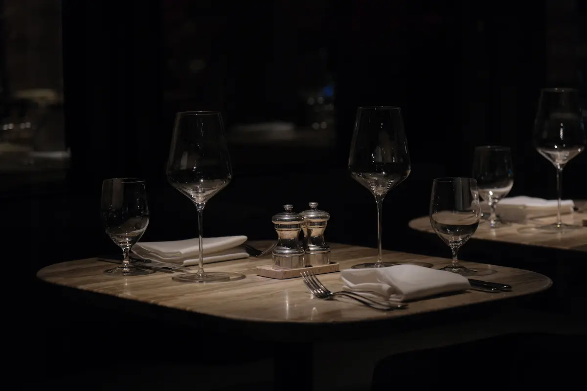 Maitre d' managing reservations on a tablet